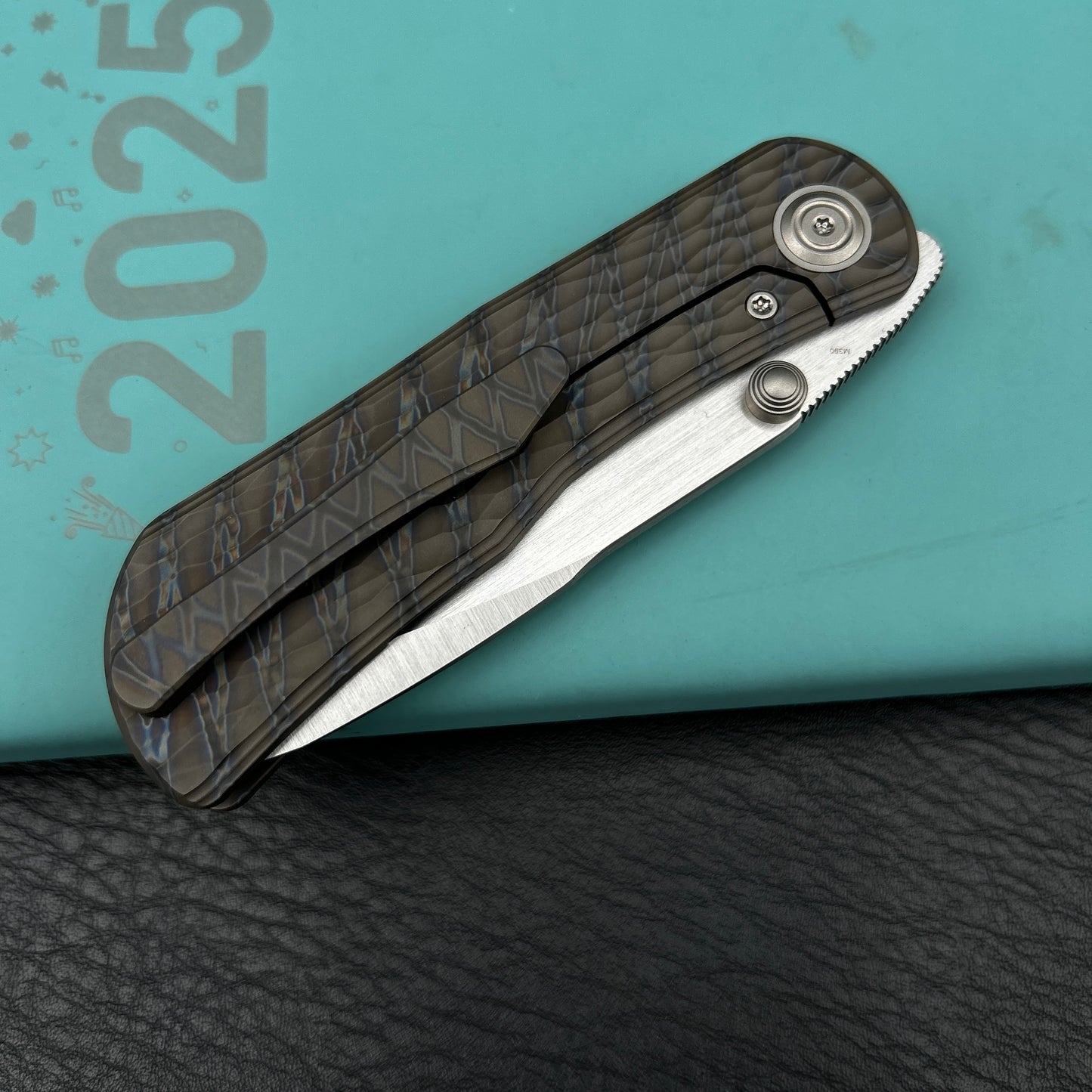 KB KB444B Folklore Folding Knife Flame Titanium w/ Jigged Pattern Milling Handle 3.42'' Belt Satin M390 Blade