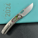 KB Knives KB377B Common Thread Frame Lock Folding Knife Grey Titanium with Watermelon Sugar CamoCarbon 2.95'' M390 Blade