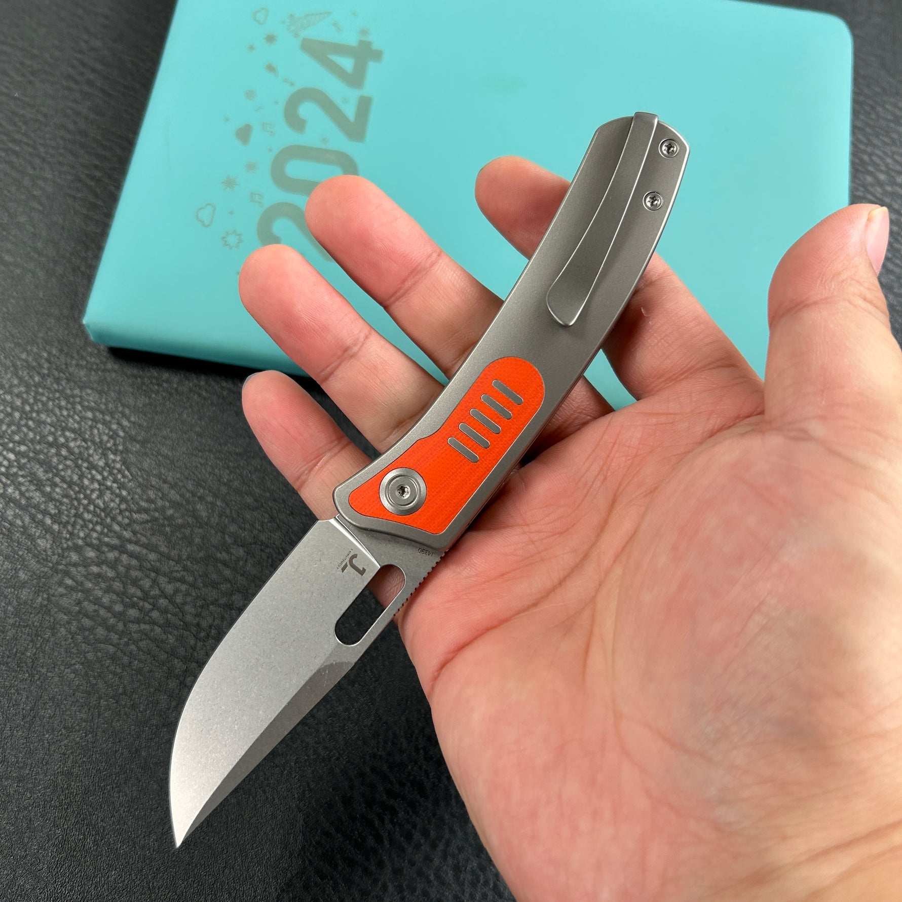 KB KNIVES  KB377A Common  Thread Frame Lock Folding Knife Grey Titanium with Orange G10 Inlays 2.95'' M390 Blade