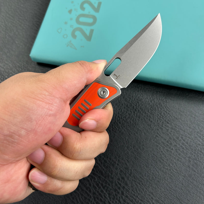 KB Knives  KB377A Common  Thread Frame Lock Folding Knife Grey Titanium with Orange G10 Inlays 2.95'' M390 Blade