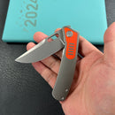 KB Knives  KB377A Common  Thread Frame Lock Folding Knife Grey Titanium with Orange G10 Inlays 2.95'' M390 Blade