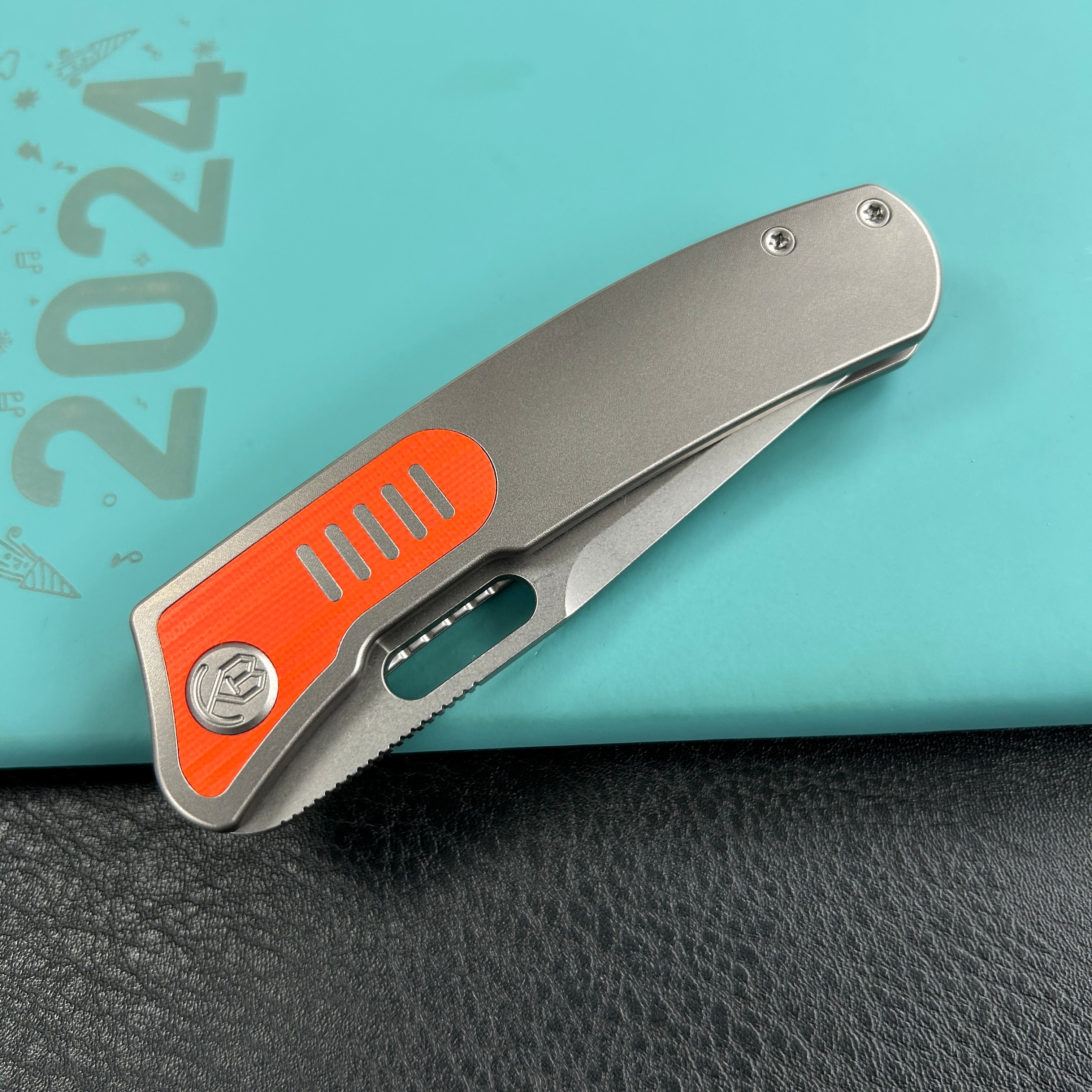 KB Knives  KB377A Common  Thread Frame Lock Folding Knife Grey Titanium with Orange G10 Inlays 2.95'' M390 Blade