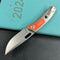 KB Knives  KB377A Common  Thread Frame Lock Folding Knife Grey Titanium with Orange G10 Inlays 2.95'' M390 Blade