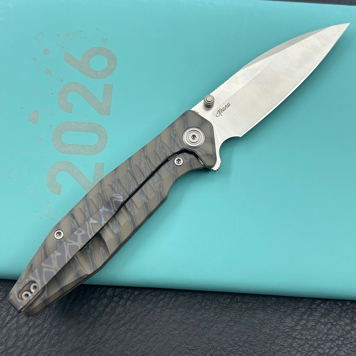 KU knife  KU474C Whammy Framelock Flame Ano Ti Folding Knife
