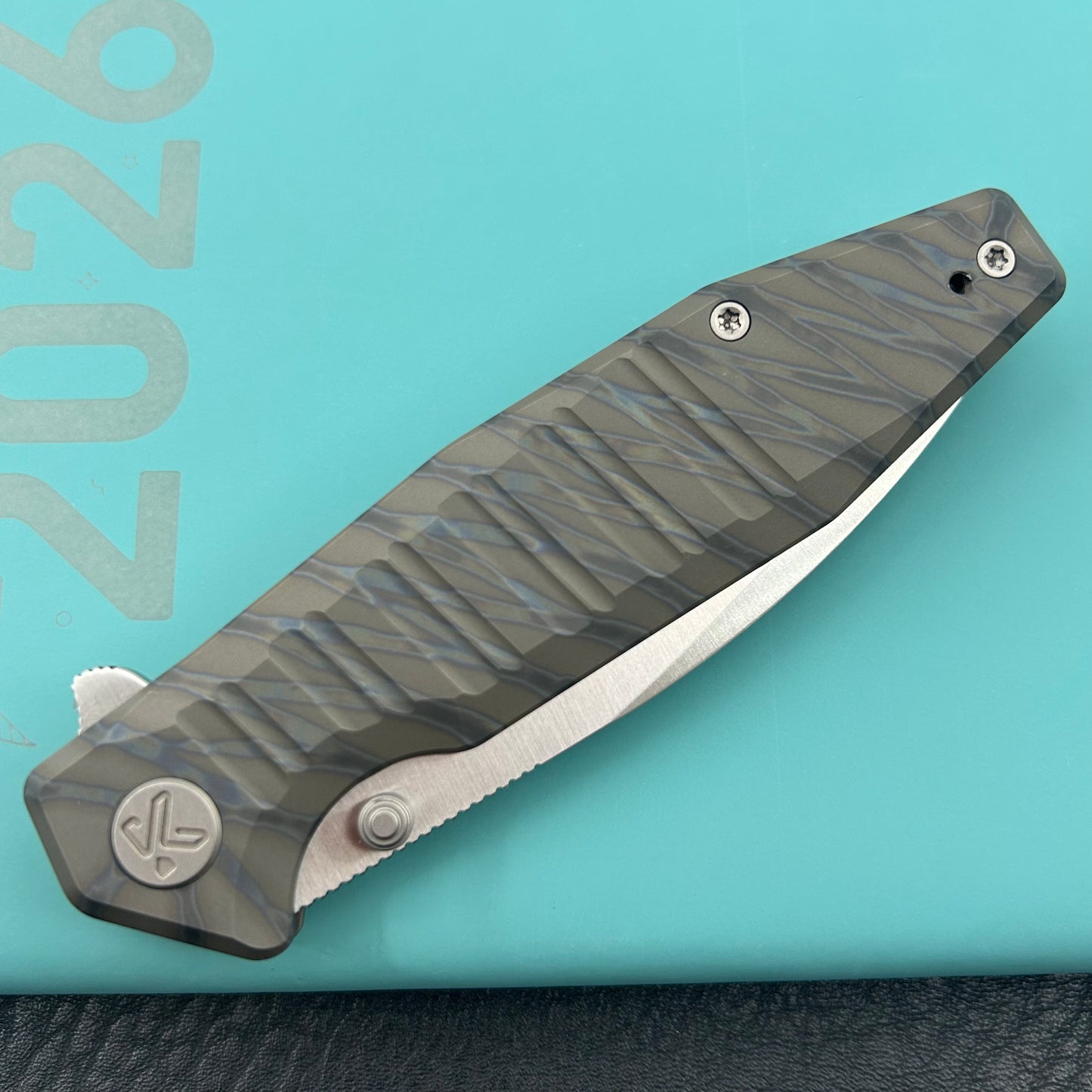 KU knife  KU474C Whammy Framelock Flame Ano Ti Folding Knife