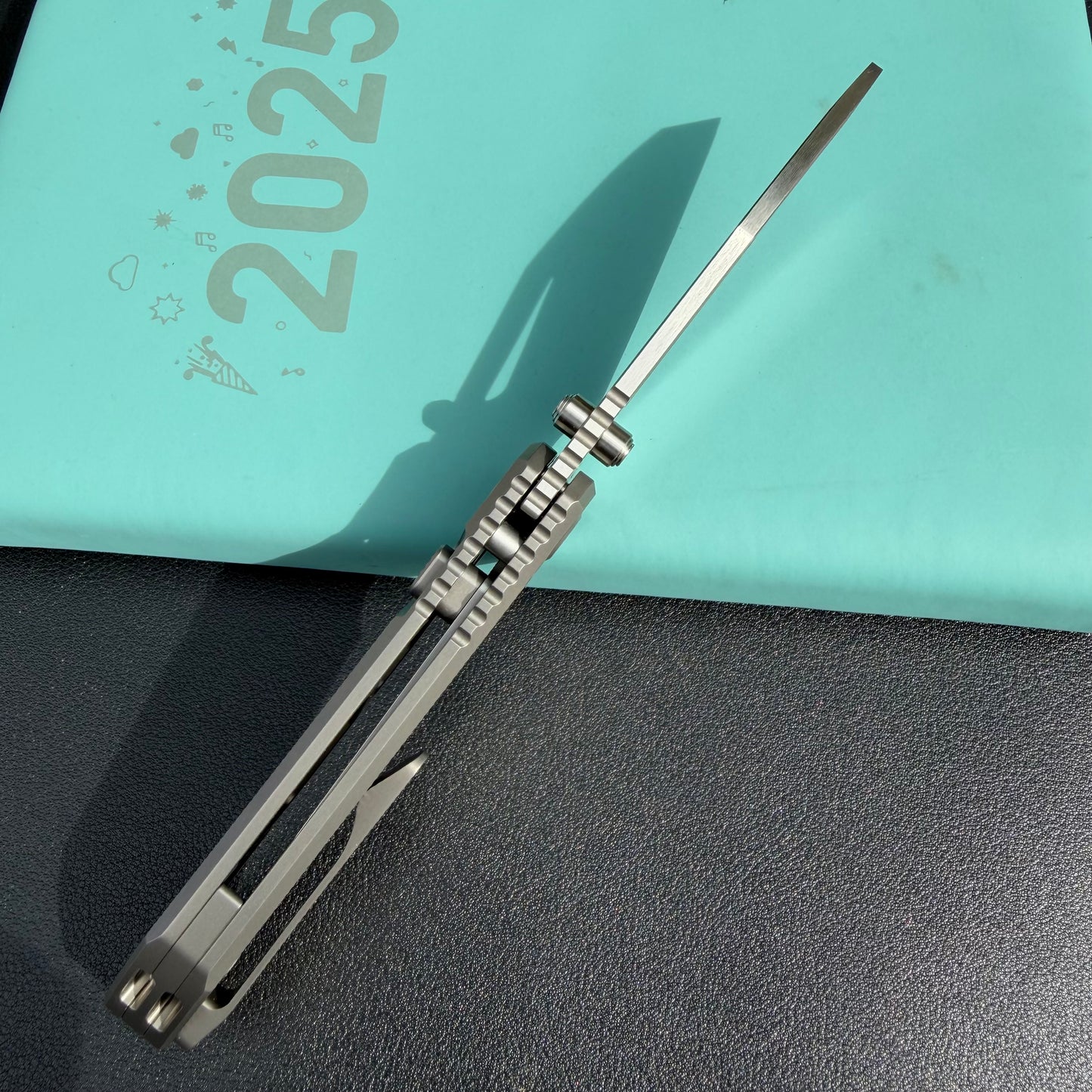 KB KB435A Venom Top Liner Lock Pocket Folding Knife Sandblast Titanium w/ Radial Milling 3.46" Belt Satin  CPM S90V Blade
