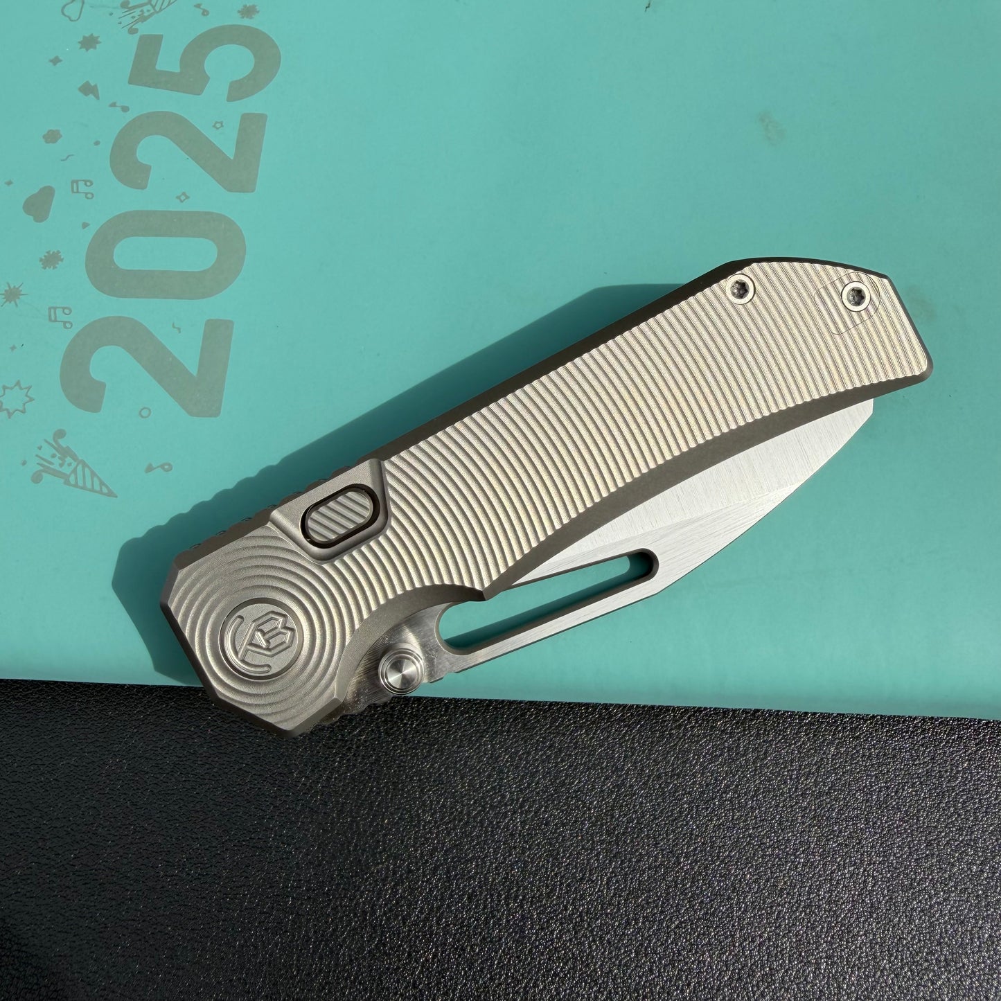 KB KB435A Venom Top Liner Lock Pocket Folding Knife Sandblast Titanium w/ Radial Milling 3.46" Belt Satin  CPM S90V Blade