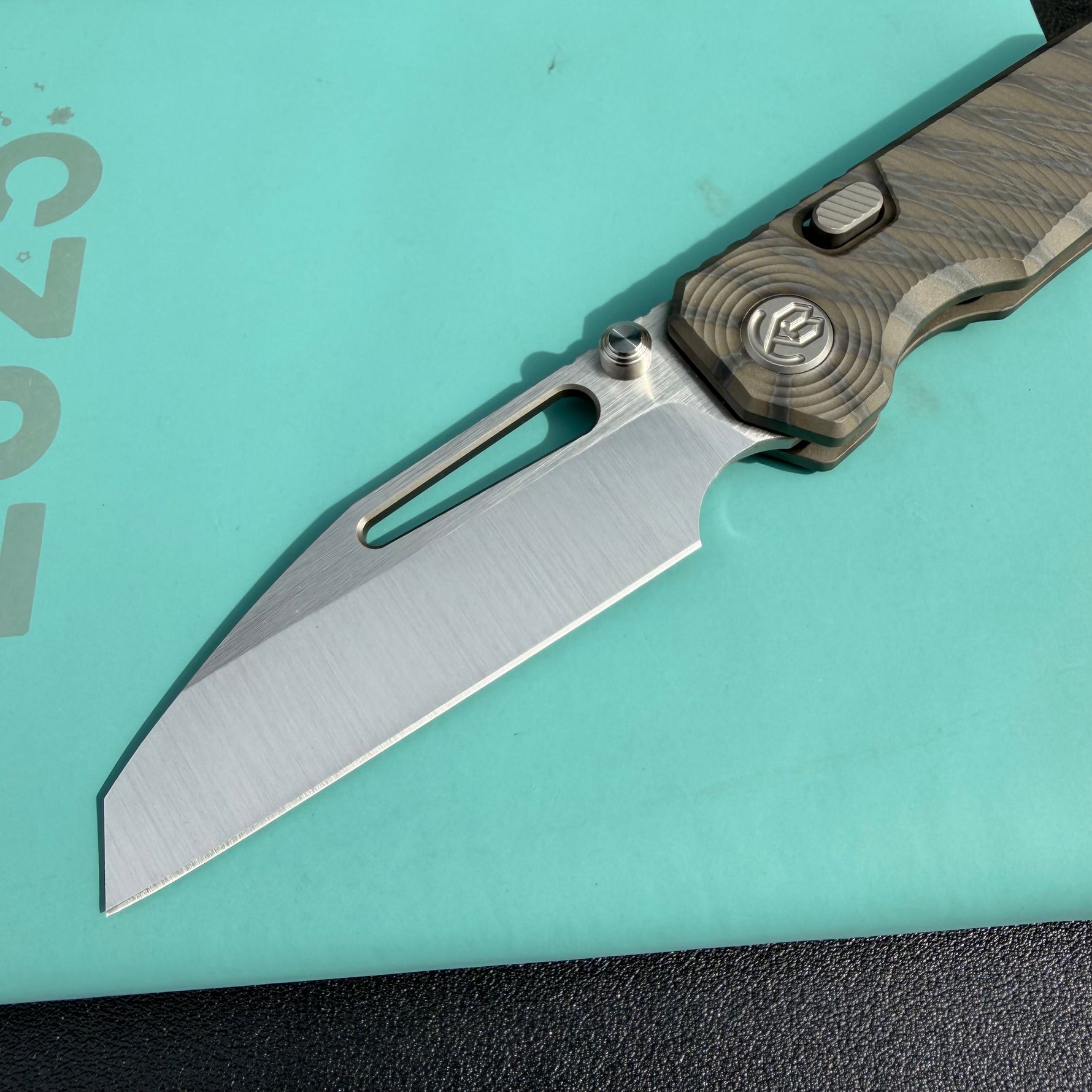 KB Venom KB435B Top Liner Lock Pocket Folding Knife Flame Ano Titanium w/ Radial Milling 3.46" Belt Satin CPM S90V Blade