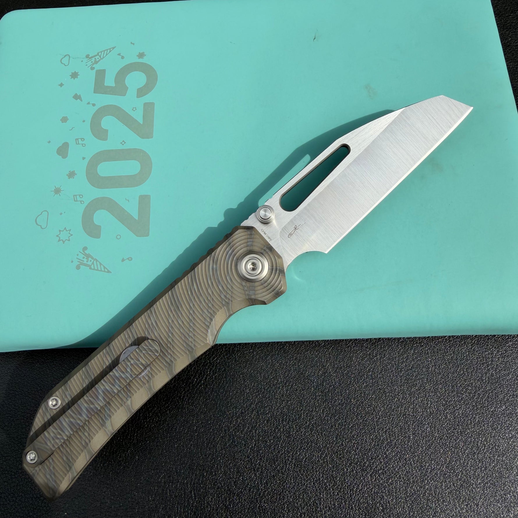 KB Venom KB435B Top Liner Lock Pocket Folding Knife Flame Ano Titanium w/ Radial Milling 3.46" Belt Satin CPM S90V Blade