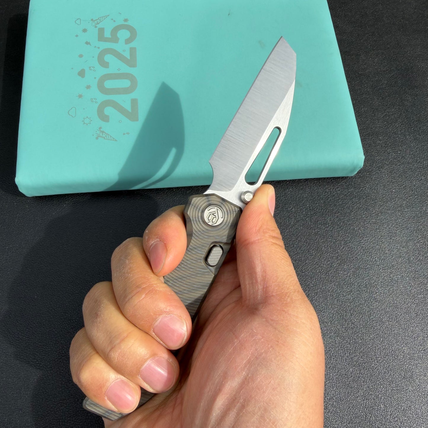 KB Venom KB435B Top Liner Lock Pocket Folding Knife Flame Ano Titanium w/ Radial Milling 3.46" Belt Satin CPM S90V Blade