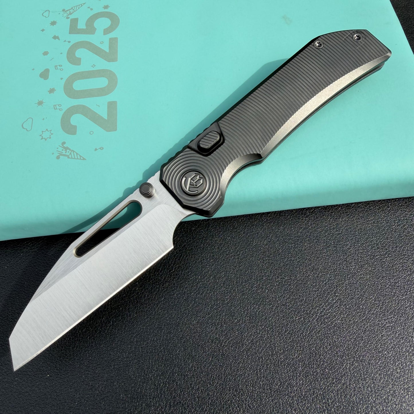 KB Venom KB435C Top Liner Lock Pocket Folding Knife Flame Ano Titanium w/ Radial Milling 3.46" Belt Satin CPM S90V Blade  Check out the  KB435B  here:  https://knifeglobal.com/search?q=kb435&options%5Bprefix%5D=last&type=product
