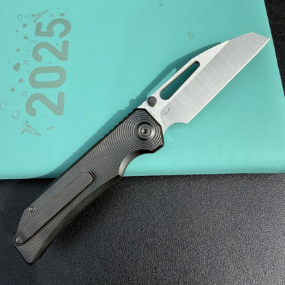 KB Venom KB435C Top Liner Lock Pocket Folding Knife Flame Ano Titanium w/ Radial Milling 3.46" Belt Satin CPM S90V Blade  Check out the  KB435B  here:  https://knifeglobal.com/search?q=kb435&options%5Bprefix%5D=last&type=product