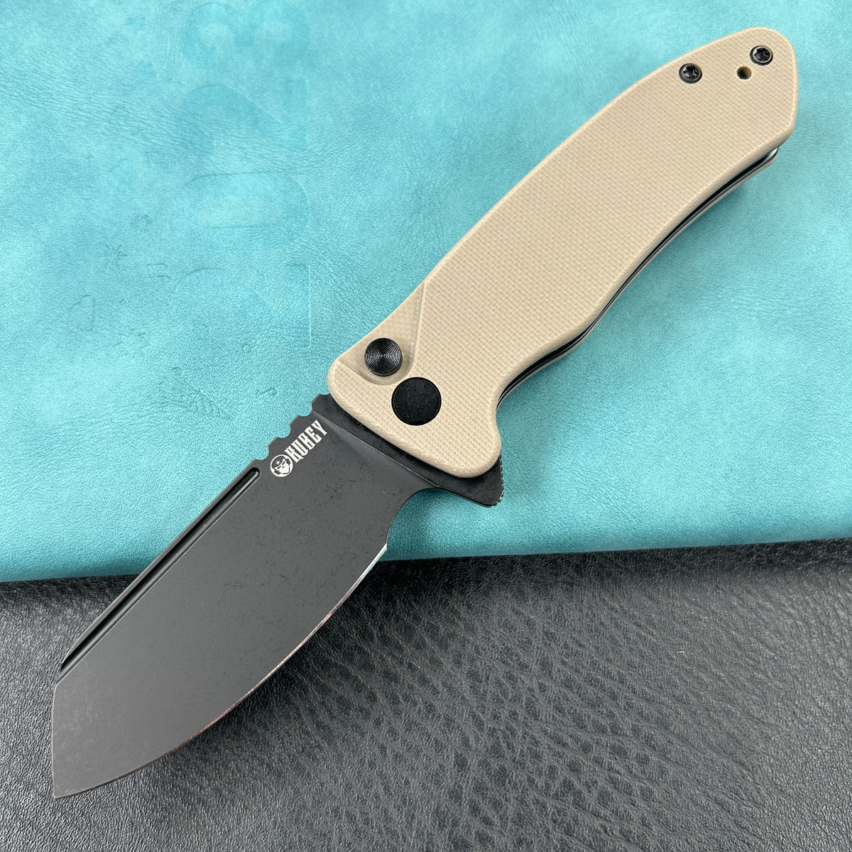 KUBEY KU336I Creon Small Pocket Knife with Button Lock Tan G10 Handle 2.87" Blackwashed AUS-10