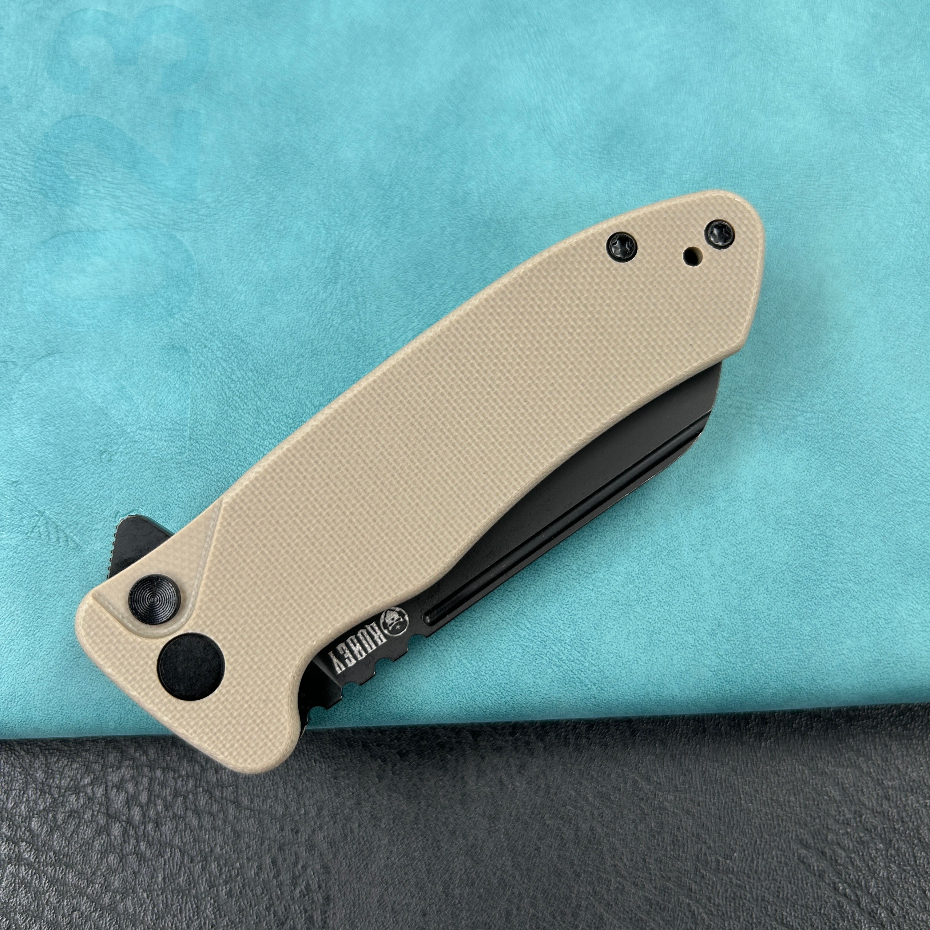 KUBEY KU336I Creon Small Pocket Knife with Button Lock Tan G10 Handle 2.87" Blackwashed AUS-10