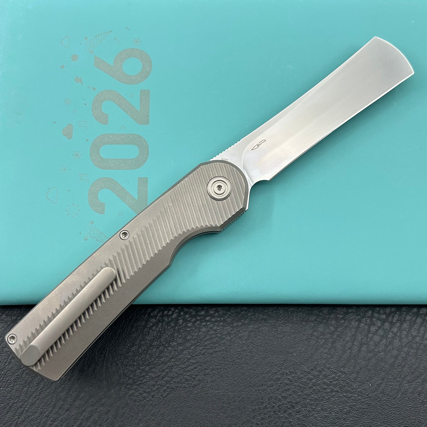 KB KNIVES KB380A Ikul Button Lock Folding Knife Gray Titanium Micro Milling 3.34'' Razor Bead Blasted M390 Blade