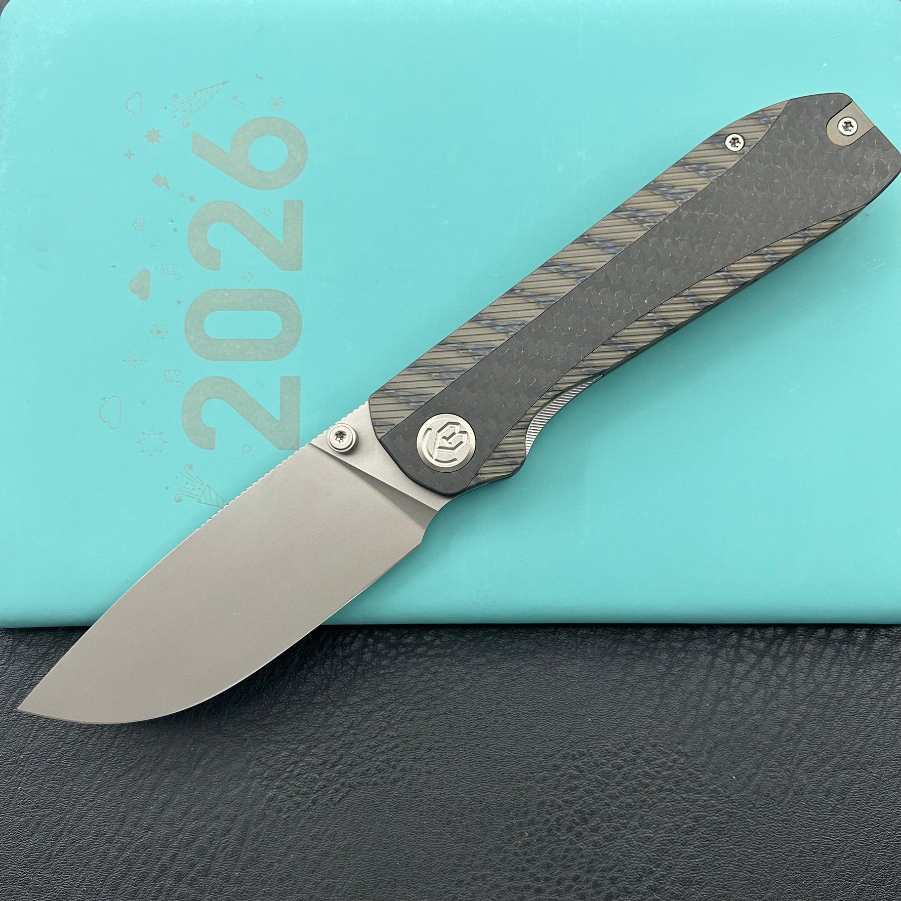 KB KNIVES KB431B Zephyr Folding Pocket Knife Flamed Titanium with Wave CF Inlay 4.65" Silver Beadblast M390