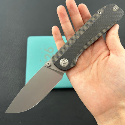 KB KNIVES KB431B Zephyr Folding Pocket Knife Flamed Titanium with Wave CF Inlay 4.65" Silver Beadblast M390