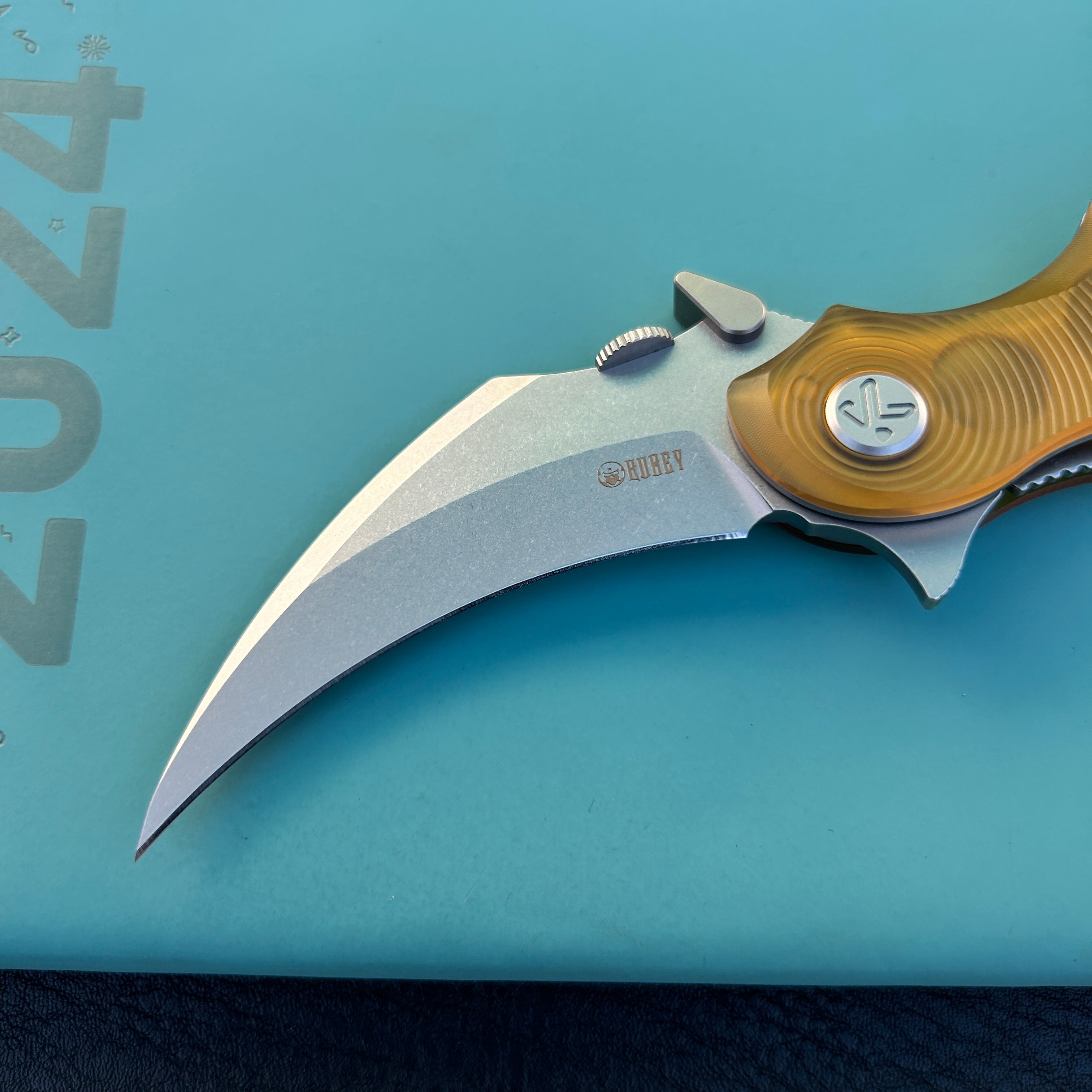 KUBEY KU298G Rogue Recurve Karambit Folding Knife  Ultem Handle 2.91" Stonewash 14C28N Blade