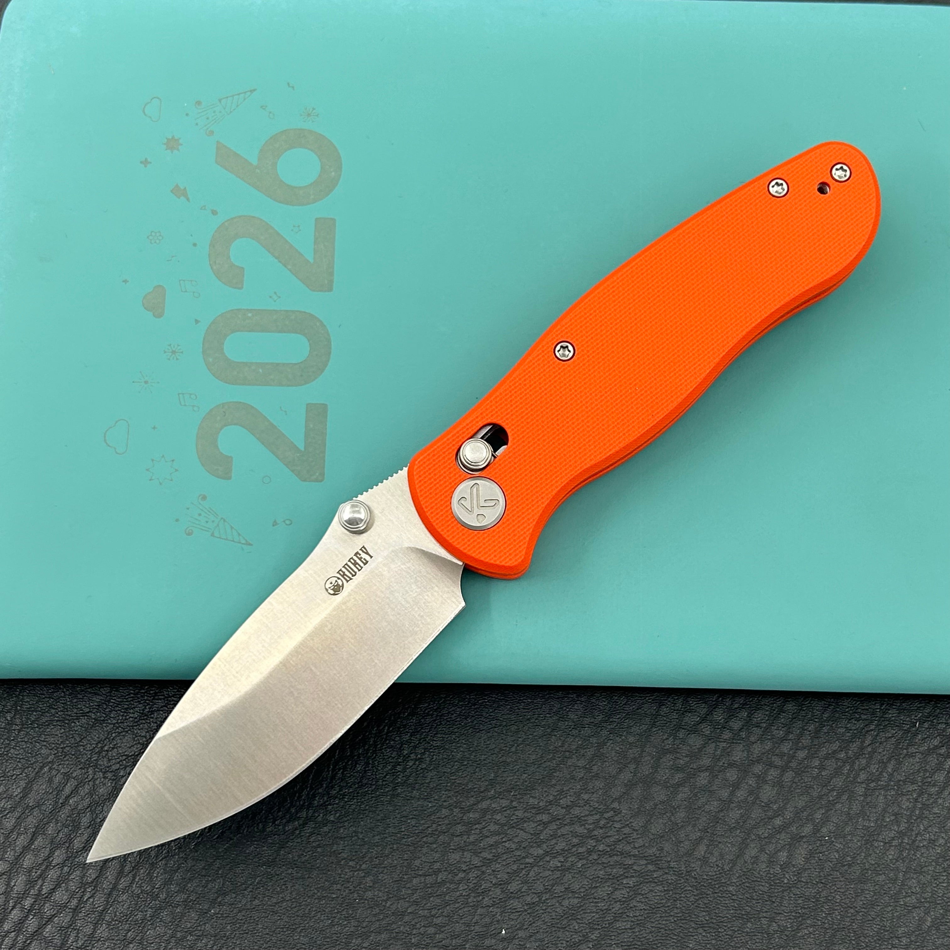 KUBEY Knife KU481B Pebble Crossbar Lock Orange  14C28N Folding Knife