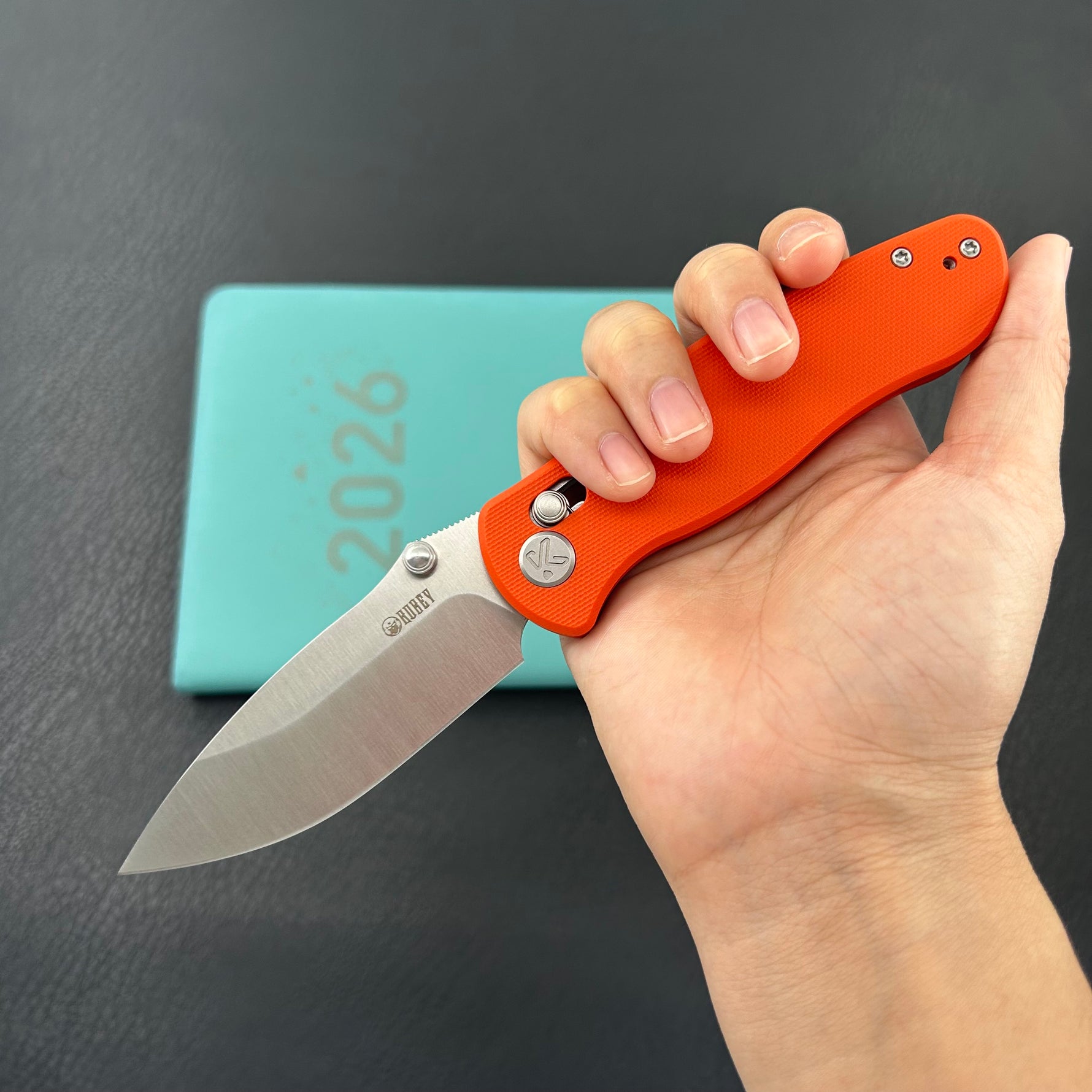 KUBEY Knife KU481B Pebble Crossbar Lock Orange  14C28N Folding Knife
