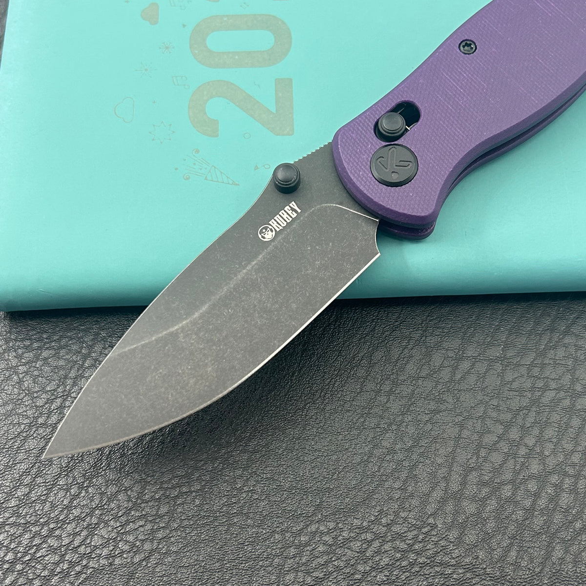 KUBEY KU481D Pebble Crossbar Lock Black Purple  14C28N Folding Knife