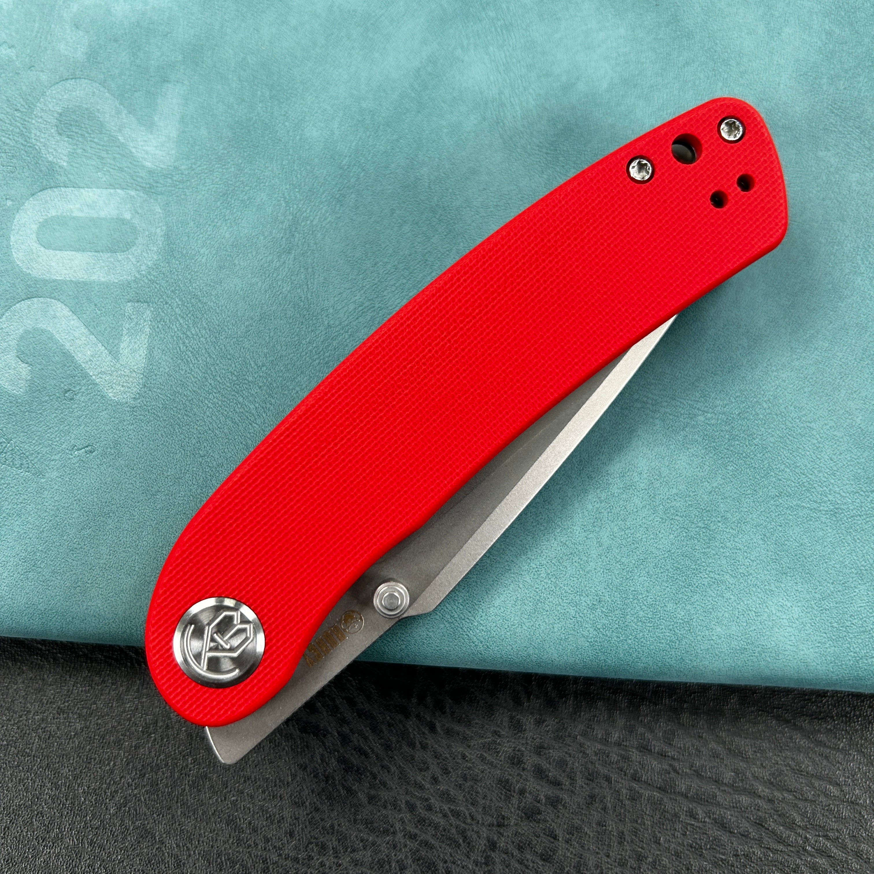 KUBEY KU344  Momentum Sherif Manganas Design Liner Lock Front Flipper / Dual Studs Open Folding Knife Red G10 Handle 3.43" Bead Blasted AUS-10