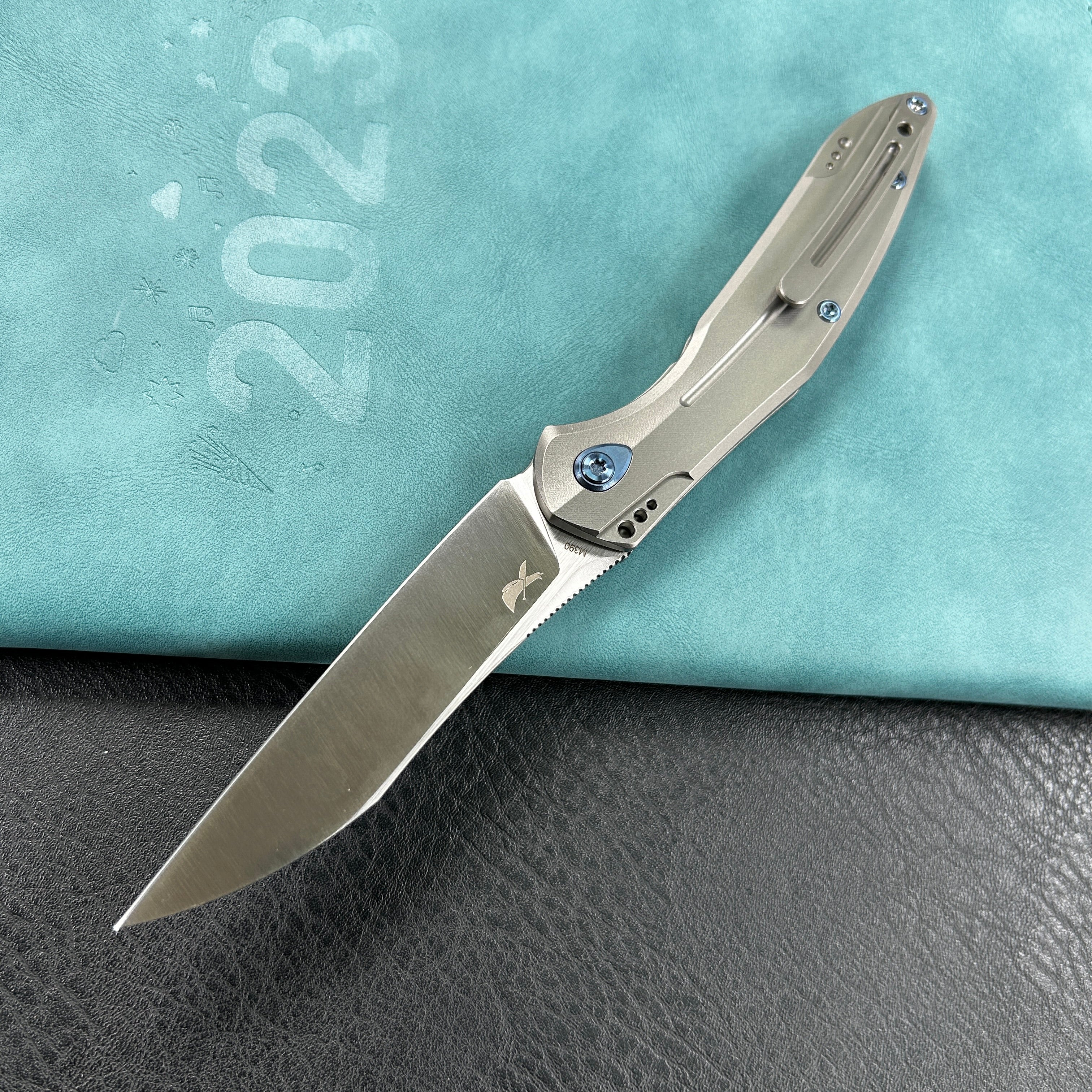 KUBEY KB299C  Barracuda Liner Lock Front Flipper Folding Knife Titanium Handle 3.38" Hand Polished Satin M390