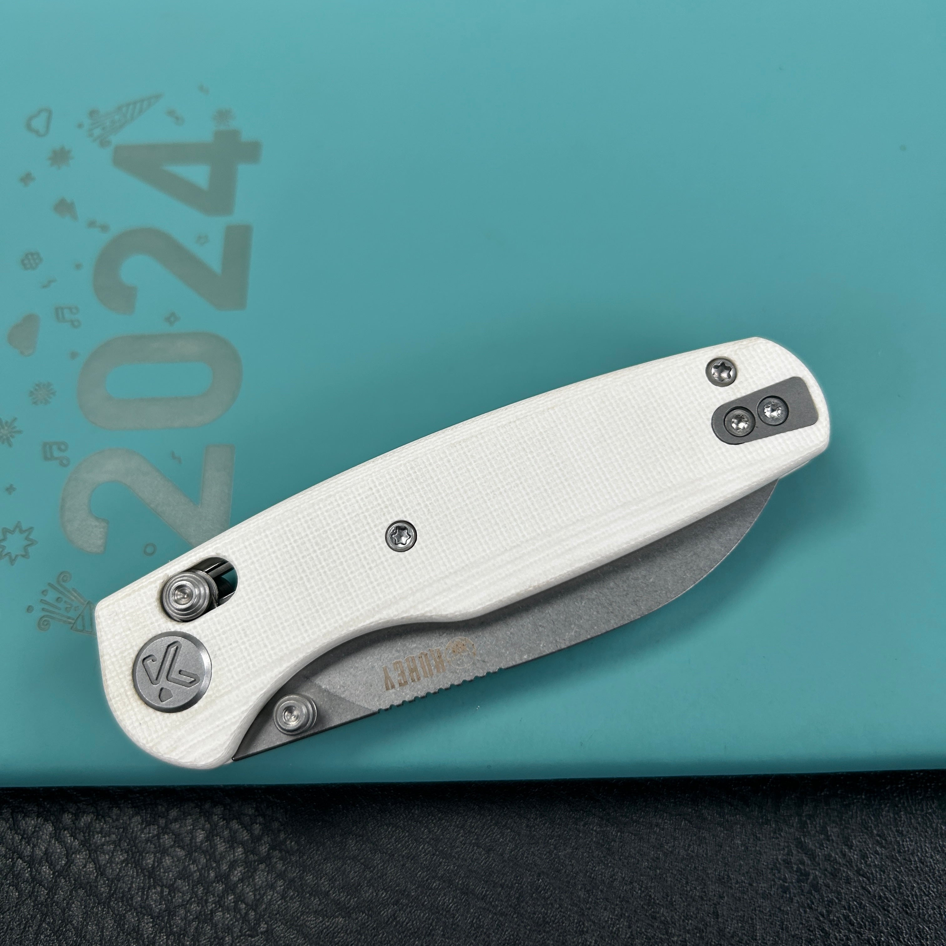 KUBEY KU288E Breeze Every Carry Pocket Knife Crossbar Lock White G10 Handle 3.03" Stonewash 14C28N Blade