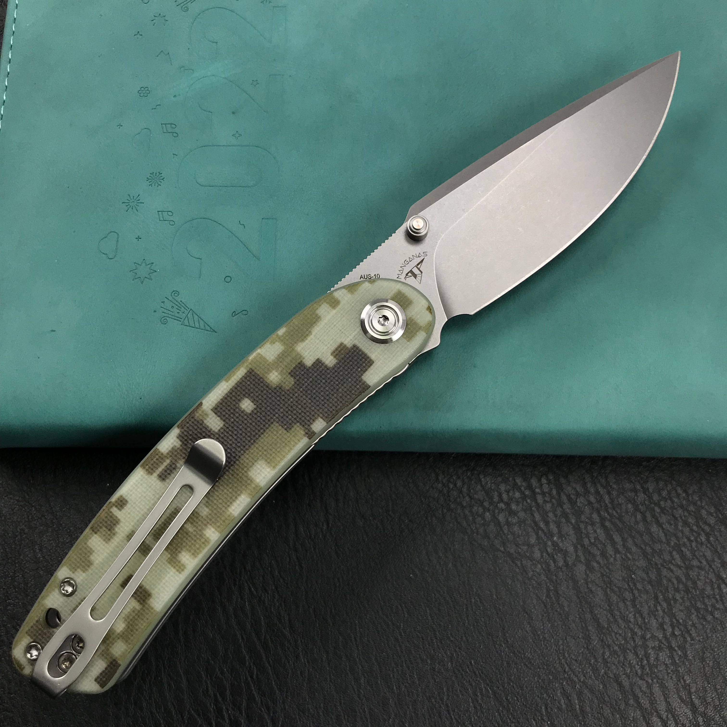 KUBEY KU344K Momentum Sherif Manganas Design Liner Lock Front Flipper / Dual Studs Open Folding Knife Digtal Camo G10 Handle 3.43" Bead Blasted AUS-10