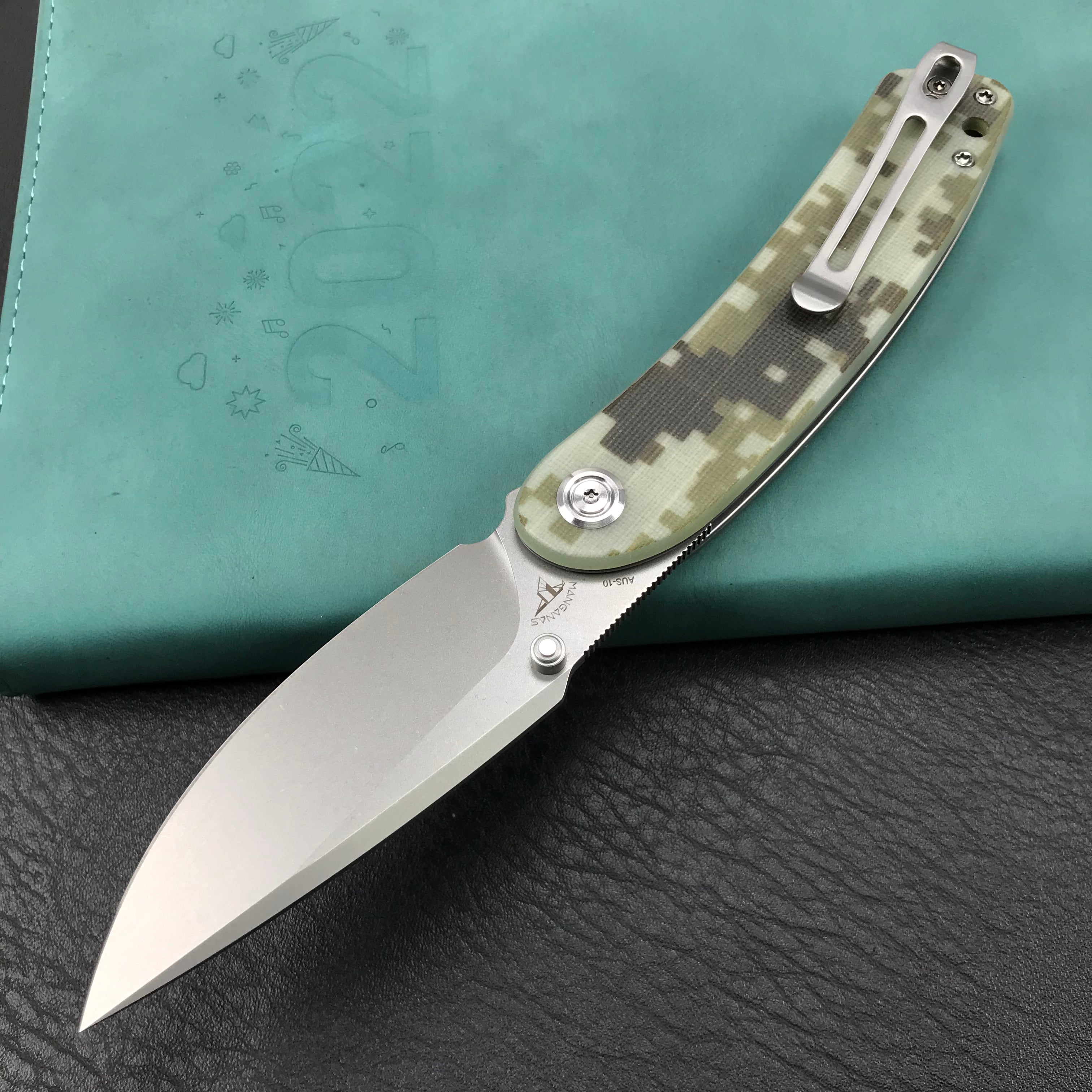 KUBEY KU344K Momentum Sherif Manganas Design Liner Lock Front Flipper / Dual Studs Open Folding Knife Digtal Camo G10 Handle 3.43" Bead Blasted AUS-10