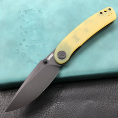 KUBEY KU344F Momentum Sherif Manganas Design Liner Lock Front Flipper / Dual Studs Open Folding Knife Translucent Yellow G10 Handle 3.43" Dark Stonewashed AUS-10