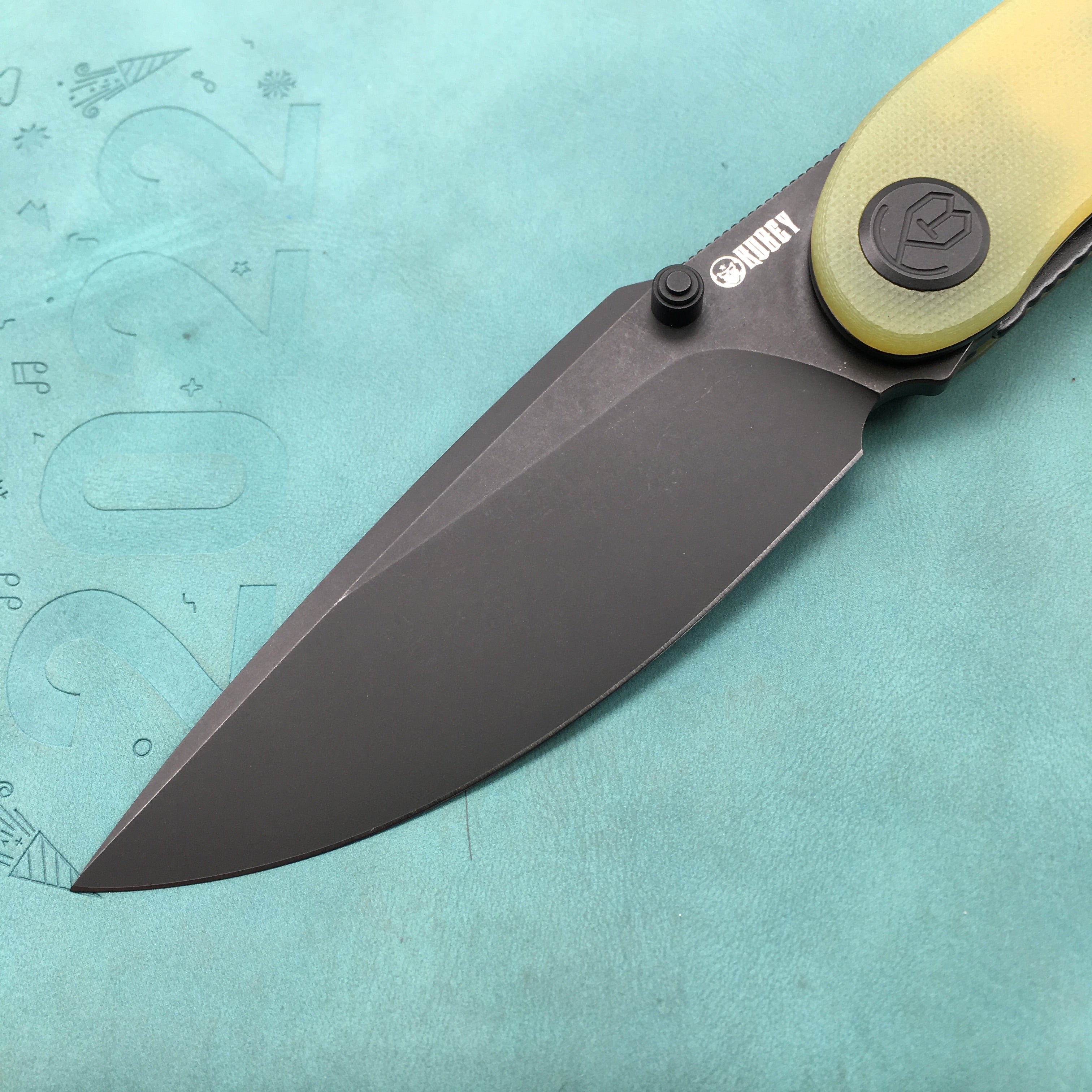 KUBEY KU344F Momentum Sherif Manganas Design Liner Lock Front Flipper / Dual Studs Open Folding Knife Translucent Yellow G10 Handle 3.43" Dark Stonewashed AUS-10