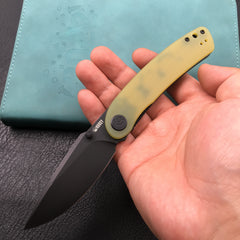 KUBEY KU344F Momentum Sherif Manganas Design Liner Lock Front Flipper / Dual Studs Open Folding Knife Translucent Yellow G10 Handle 3.43" Dark Stonewashed AUS-10