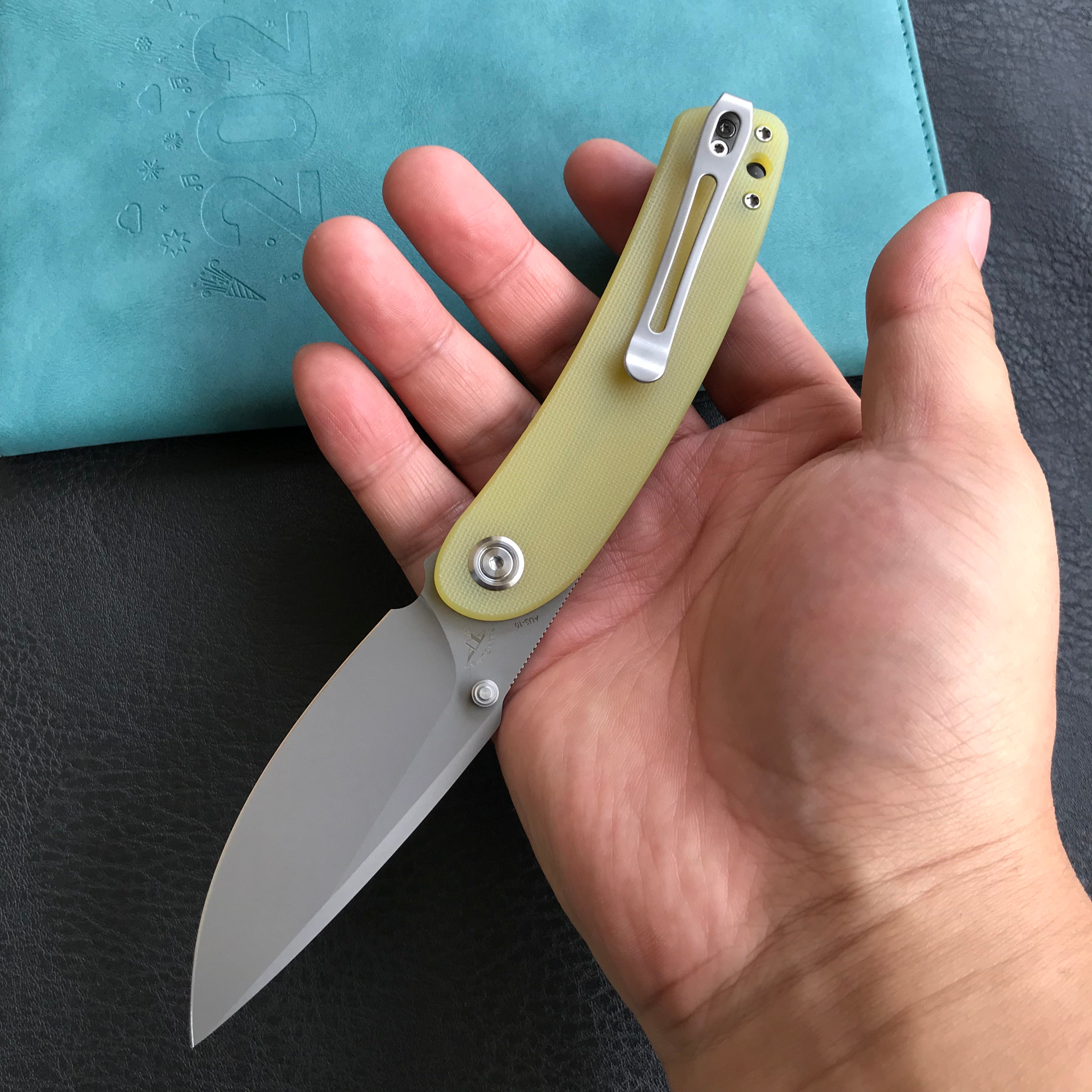 KUBEY KU344 Momentum Sherif Manganas Design Liner Lock Front Flipper / Dual Studs Open Folding Knife Translucent Yellow  G10 Handle 3.43" Bead Blasted AUS-10