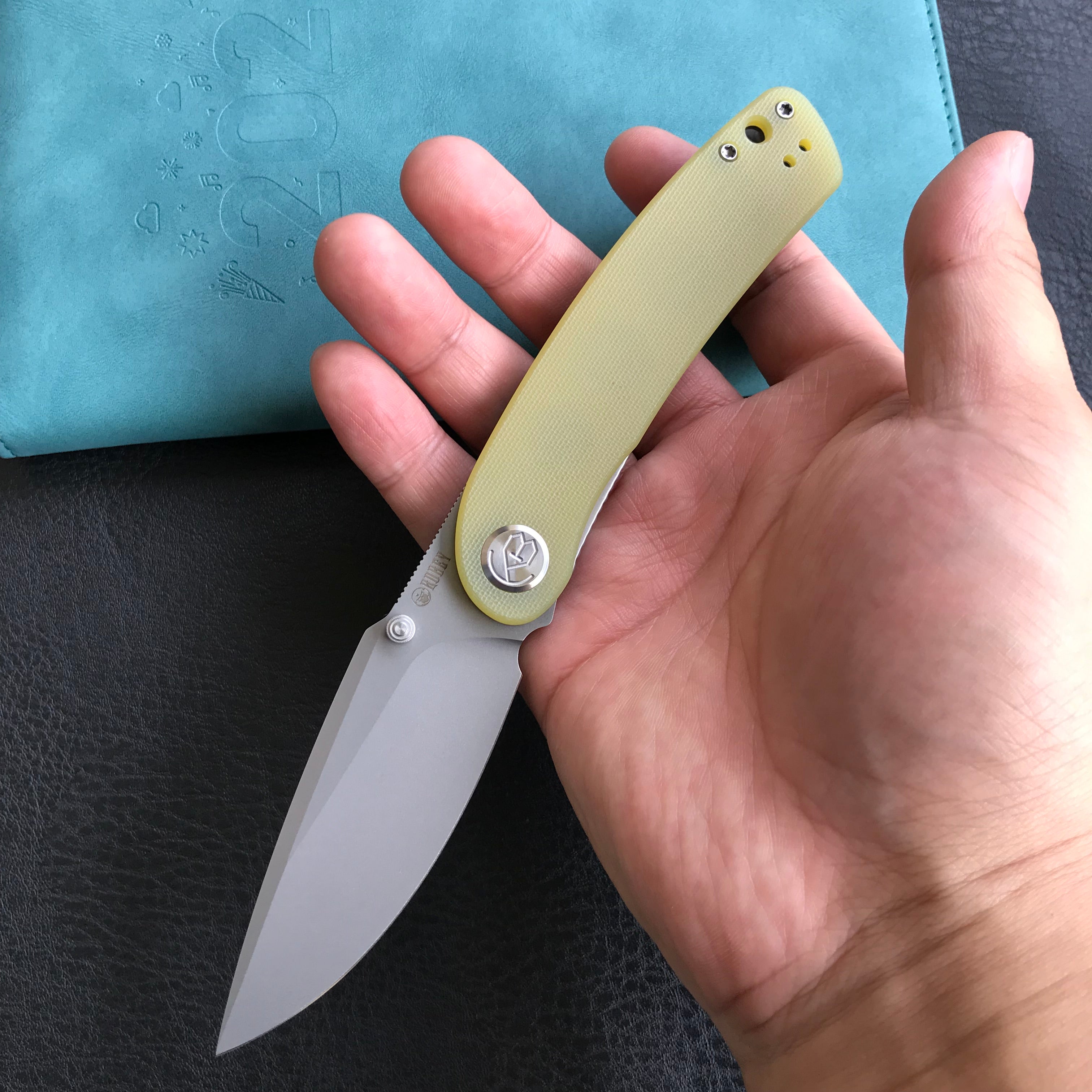 KUBEY KU344 Momentum Sherif Manganas Design Liner Lock Front Flipper / Dual Studs Open Folding Knife Translucent Yellow  G10 Handle 3.43" Bead Blasted AUS-10