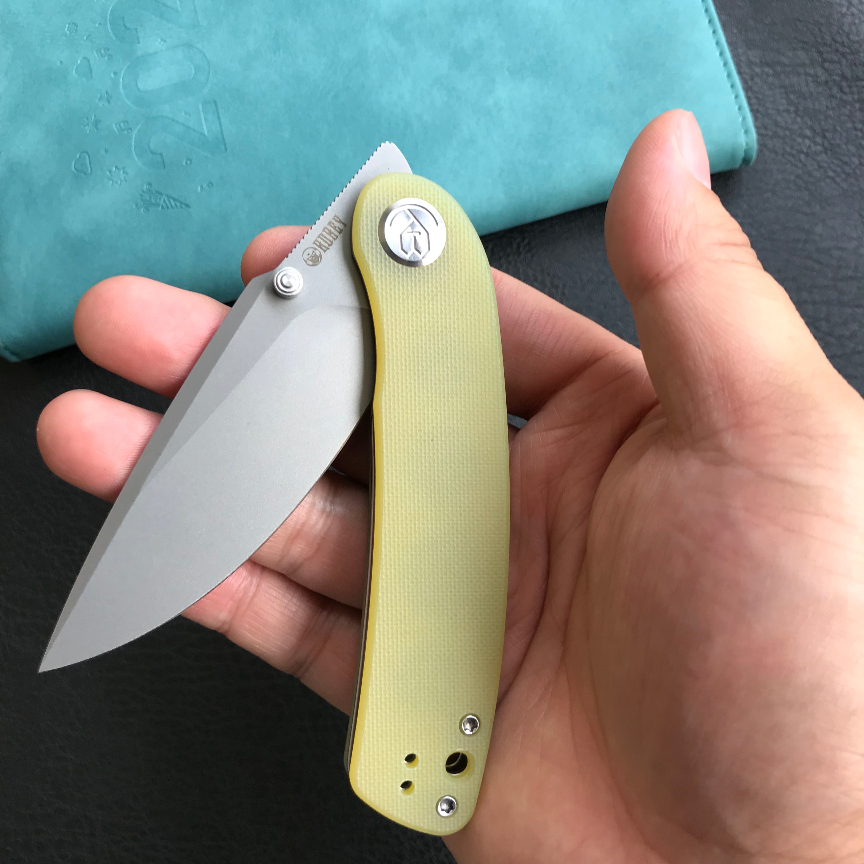 KUBEY KU344 Momentum Sherif Manganas Design Liner Lock Front Flipper / Dual Studs Open Folding Knife Translucent Yellow  G10 Handle 3.43" Bead Blasted AUS-10