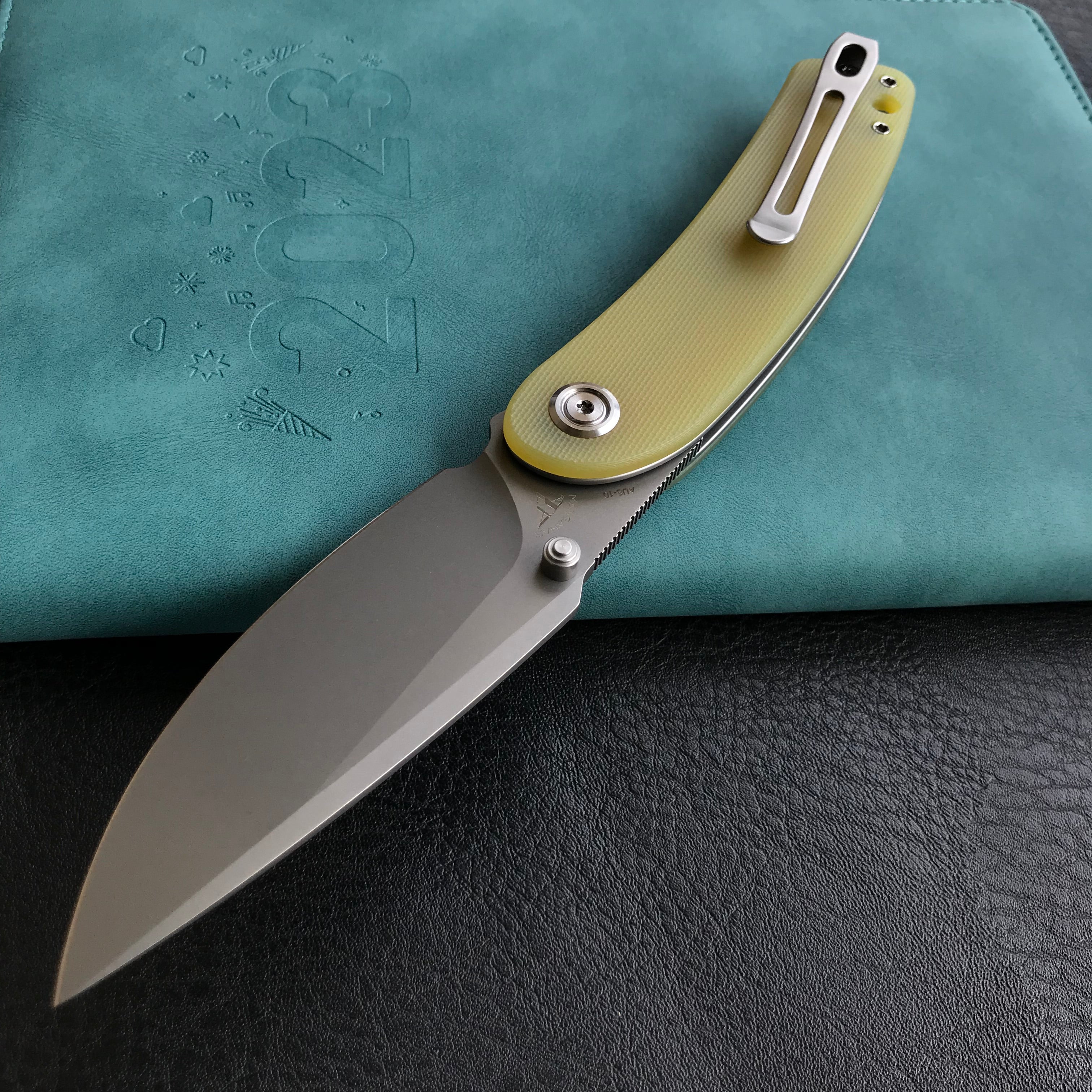 KUBEY KU344 Momentum Sherif Manganas Design Liner Lock Front Flipper / Dual Studs Open Folding Knife Translucent Yellow  G10 Handle 3.43" Bead Blasted AUS-10