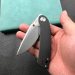 KUBEY  KU344A Momentum Sherif Manganas Design Liner Lock Front Flipper  Dual Studs Open Folding Knife Black G10 Handle 3.43" Blasted Stonewashed D2