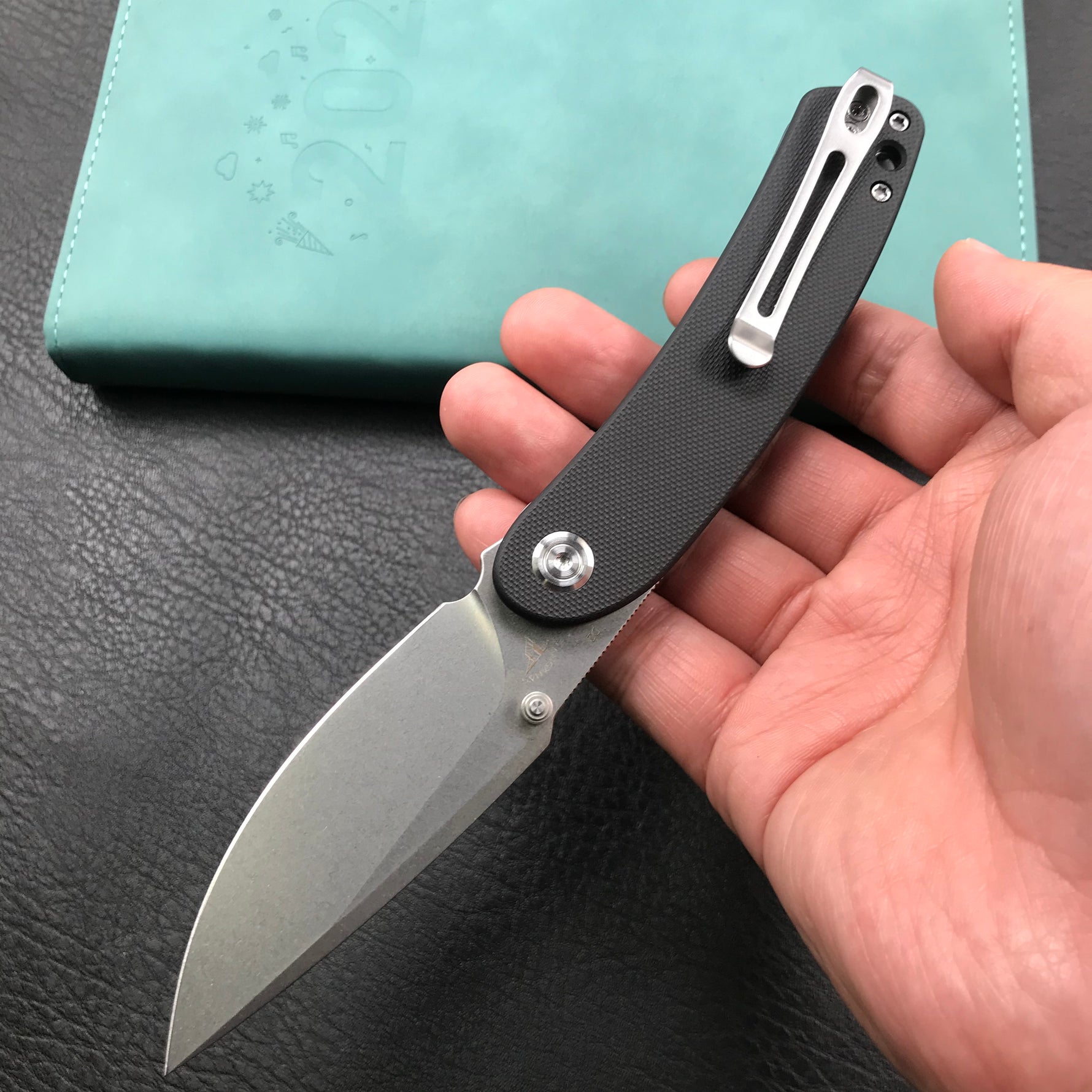 KUBEY  KU344A Momentum Sherif Manganas Design Liner Lock Front Flipper  Dual Studs Open Folding Knife Black G10 Handle 3.43" Blasted Stonewashed D2