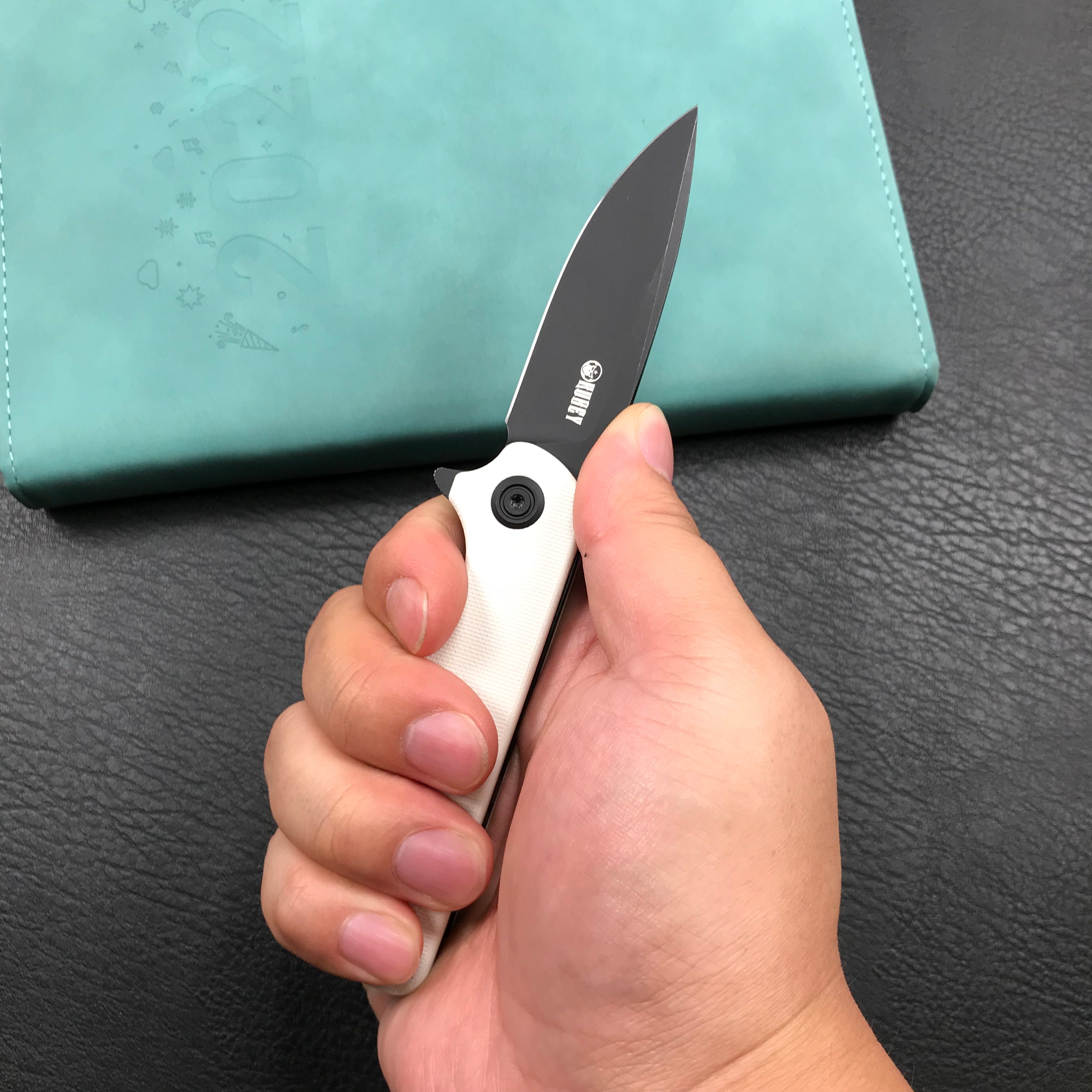 KUBEY KU233G EDC Wolverine Liner Lock Folding Pocket Knife White G10 Handle 2.95" Dark Stonewashed D2